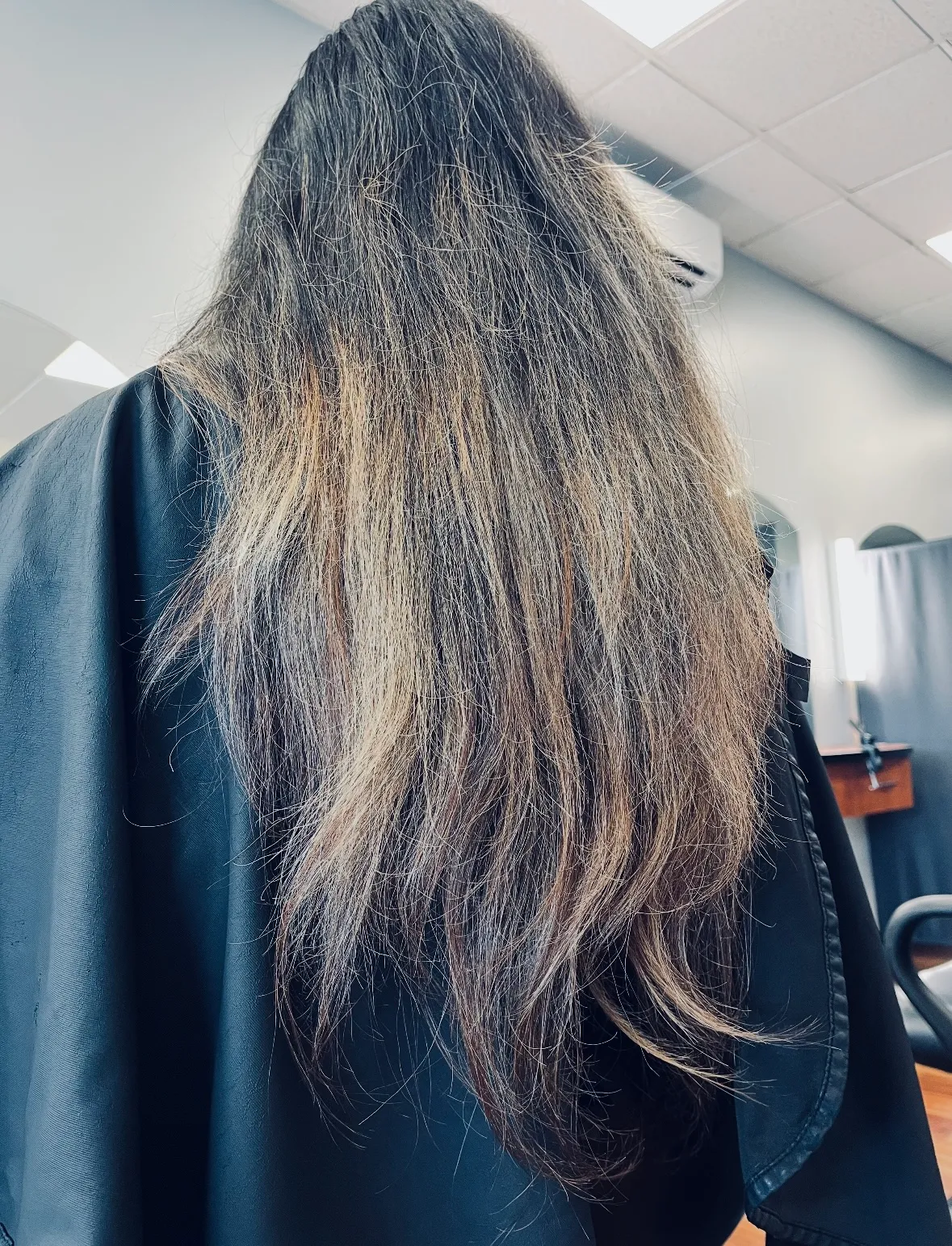 Before: long, frizzy hair with split, dry ends