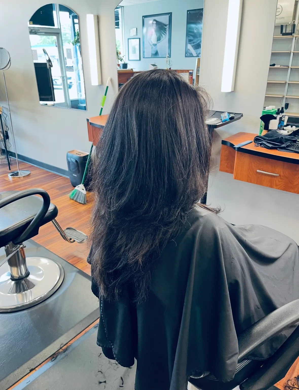 After: a long layered cut with smooth shape and volume