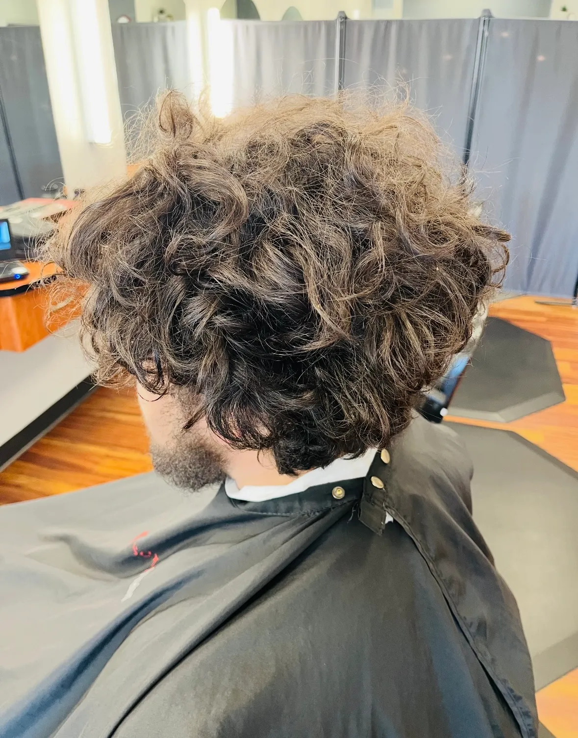 Before: thick, curly hair before the cut